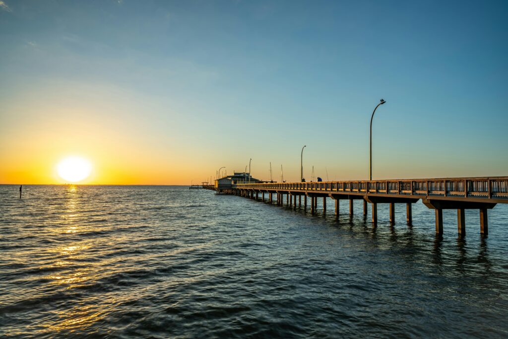Pier and sunset. By N Quash
